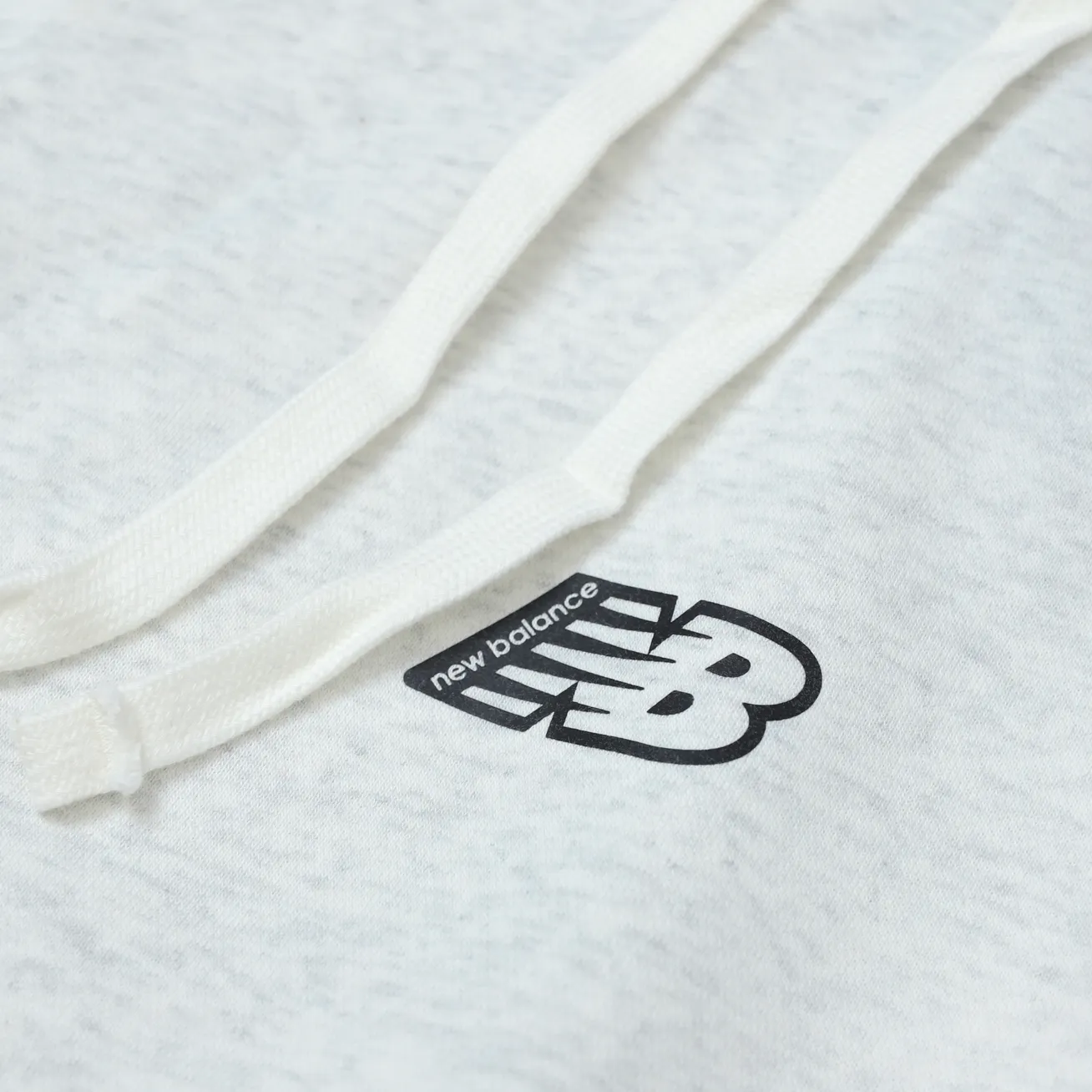 New Balance Essential Fleece Logo Hoodie [AMT23511]